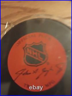 1983-84 Allstar Wayne Gretzky Hockey Card With A Signed Hockey Puck