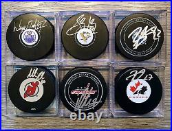 Authentic Puck Signed Lot Gretzky-Crosby-McDavid+Team Can-Ovechkin-Brodeur