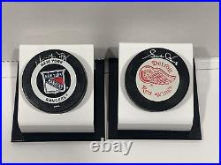 Upper Deck Hockey Wayne Gretzky Gordie Howe Signed Hockey Pucks (Holograms Only)