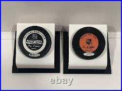 Upper Deck Hockey Wayne Gretzky Gordie Howe Signed Hockey Pucks (Holograms Only)