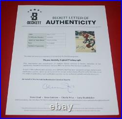 WAYNE GRETZKY Signed New York RANGERS 8x10 PHOTO Beckett LOA (BAS) BA88668