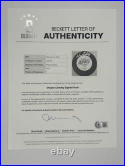 WAYNE GRETZKY signed KINGS puck BECKETT COA Full LOA