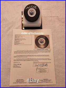 WAYNE GRETZKY signed OILERS puck JSA COA Full LOA full signature