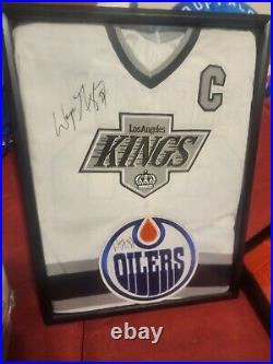 Wayne Gretzky Autographed Kings Jersey And Autographed Oilers Crest