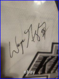 Wayne Gretzky Autographed Kings Jersey And Autographed Oilers Crest