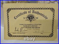 Wayne Gretzky Hockey Card and Hand Signed Puck With Certificate of Authenticity