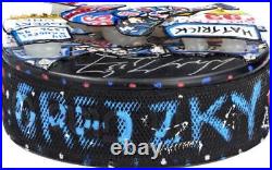 Wayne Gretzky New York Rangers Autographed Hockey Puck Hand Item#12691600