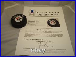 Wayne Gretzky Signed Team Canada Hockey Puck Autographed Beckett BAS LOA 1A Wayne Gretzky Signed Team Canada Hockey Puck Autographed Beckett BAS LOA 1A
