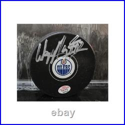 Wayne Gretzky of the Edmonton Oilers autographed logo hockey puck COA