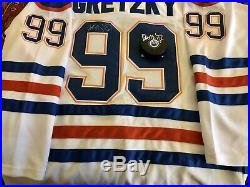 Wayne Gretzky signed Edmonton Oilers Jersey and Puck Bonus Signed Blues Puck