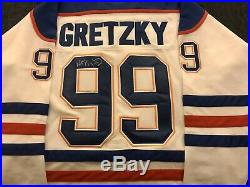 Wayne Gretzky signed Edmonton Oilers Jersey and Puck Bonus Signed Blues Puck