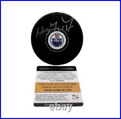 Wayne Gretzky signed autographed Oilers puck. ProCert Hologram. Gretzky